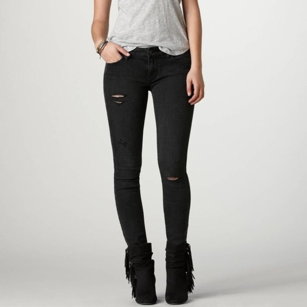 American Eagle distressed black jeggings.